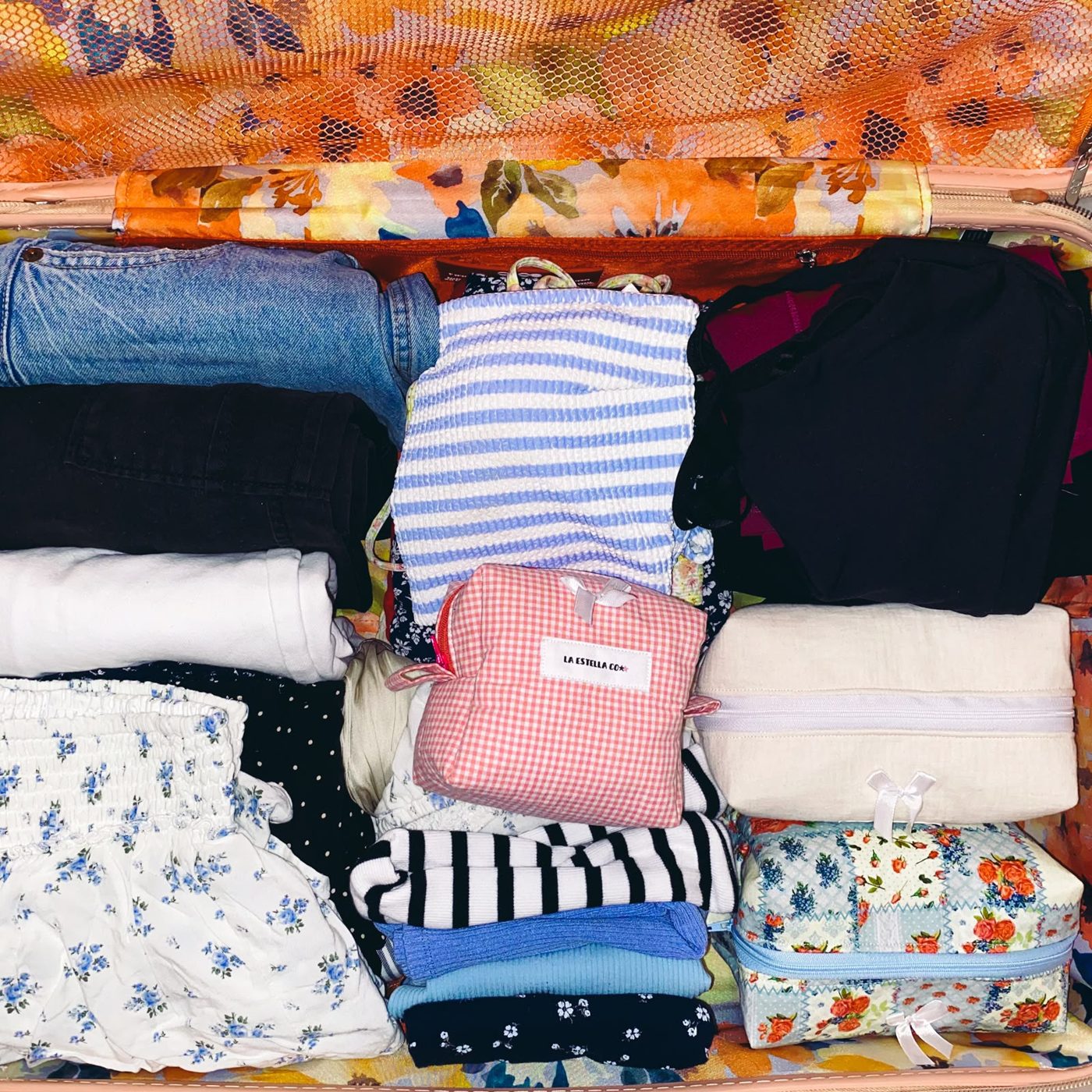 Maleta organizada con bolsos La Estella Co